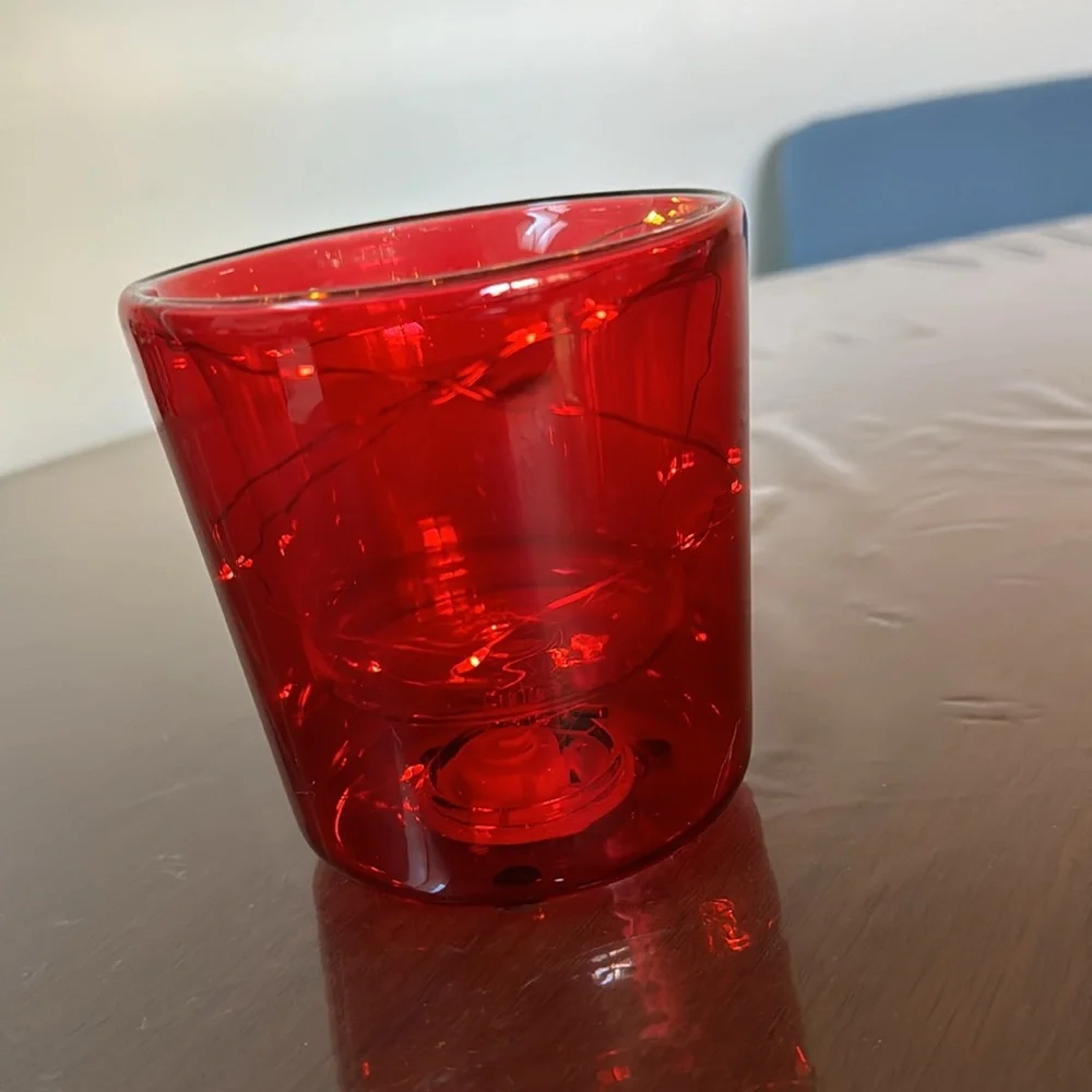It’s little decorative vase you can decorate with flowers or anything you like.